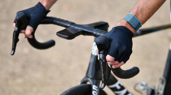 Rider's hands on the bar tops